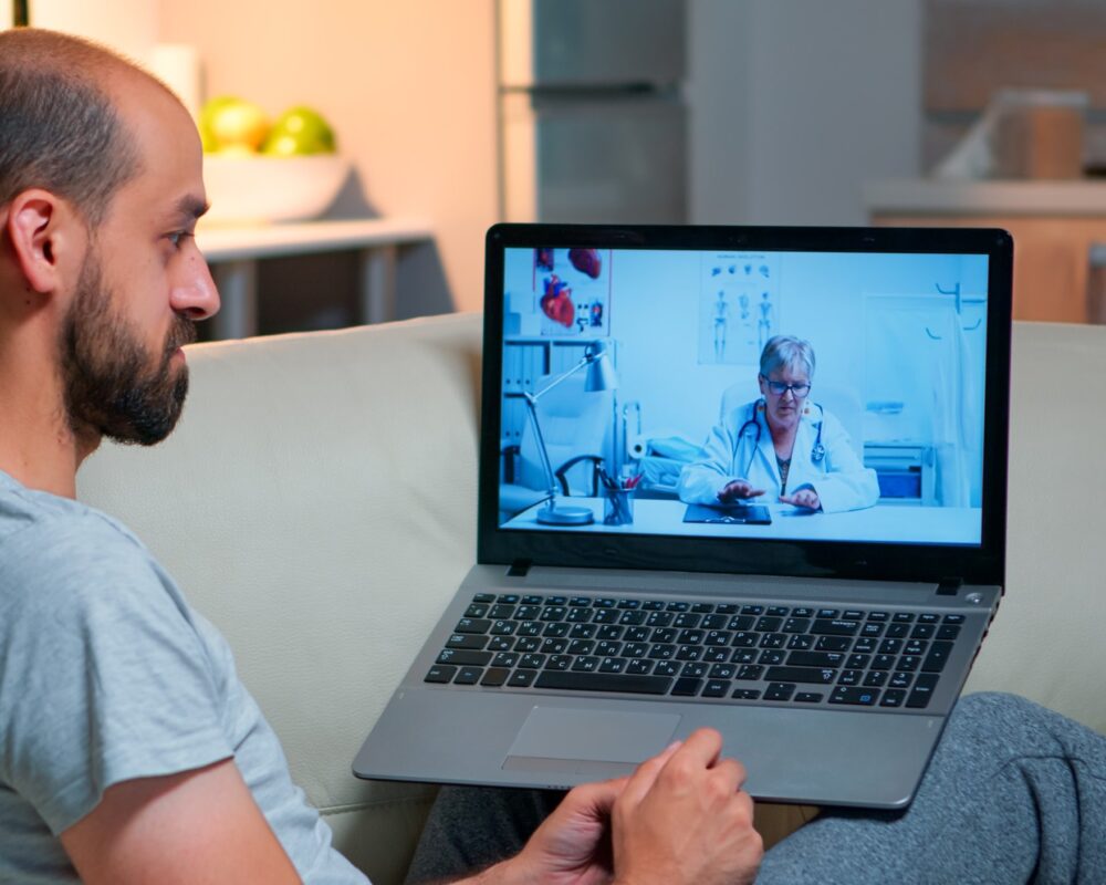 caucasian-male-chatting-with-physician-doctor-online-telemedicine-consultation