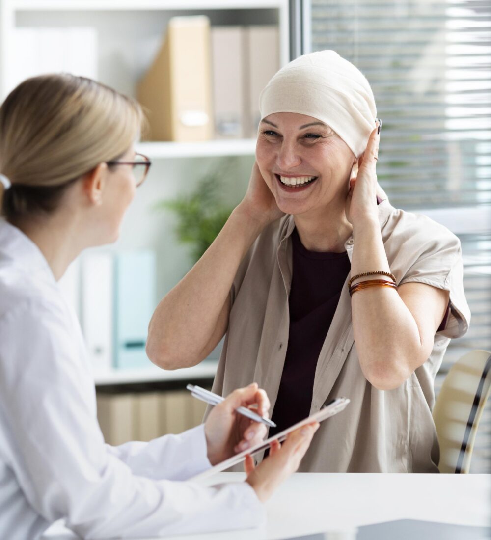 woman-with-cancer-talking-with-doctor