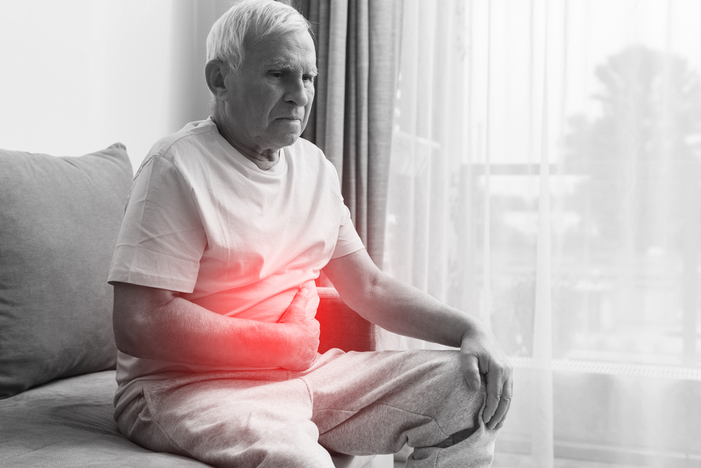 Man with stomach ulcer