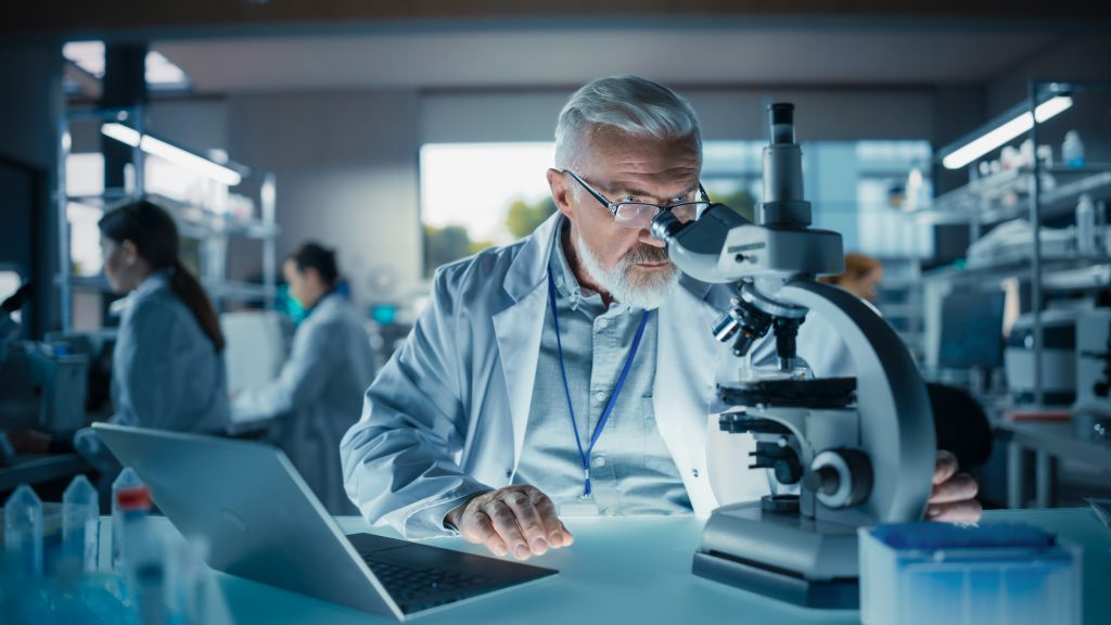 Doctor looking at cancer cells