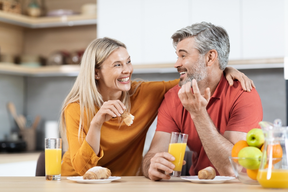 couple drinking orange juice